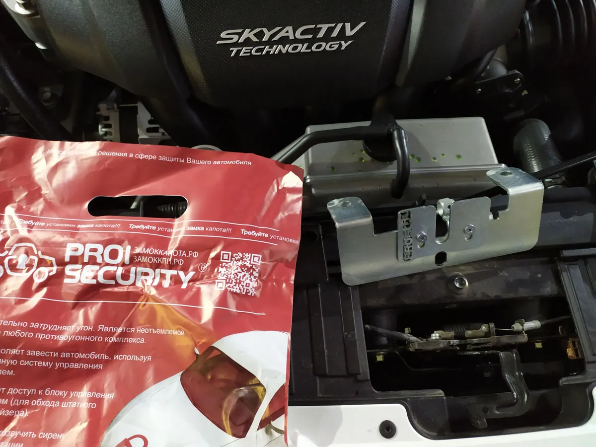 Установка замка капота на Mazda 6